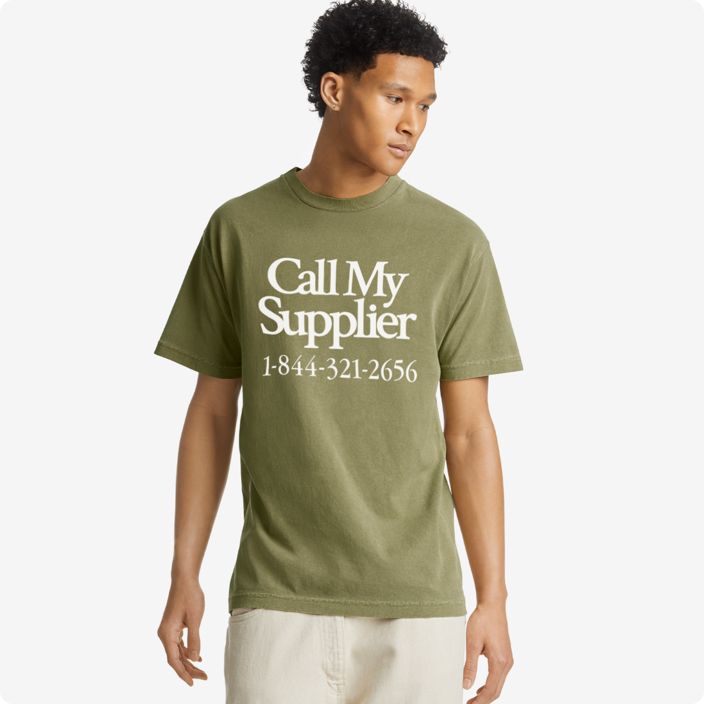 Man wearing a green t-shirt with 'Call My Supplier' text